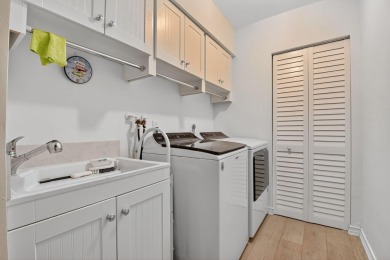 THIS COMPLETELY REMODELED VILLA HAS WIDE OPEN VIEWS OF THE 15TH on Delray Dunes Golf and Country Club in Florida - for sale on GolfHomes.com, golf home, golf lot