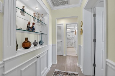 THIS COMPLETELY REMODELED VILLA HAS WIDE OPEN VIEWS OF THE 15TH on Delray Dunes Golf and Country Club in Florida - for sale on GolfHomes.com, golf home, golf lot