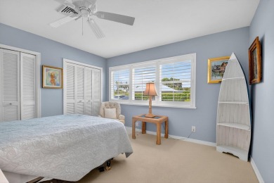 THIS COMPLETELY REMODELED VILLA HAS WIDE OPEN VIEWS OF THE 15TH on Delray Dunes Golf and Country Club in Florida - for sale on GolfHomes.com, golf home, golf lot