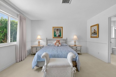 THIS COMPLETELY REMODELED VILLA HAS WIDE OPEN VIEWS OF THE 15TH on Delray Dunes Golf and Country Club in Florida - for sale on GolfHomes.com, golf home, golf lot