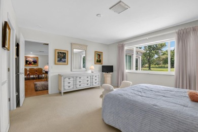THIS COMPLETELY REMODELED VILLA HAS WIDE OPEN VIEWS OF THE 15TH on Delray Dunes Golf and Country Club in Florida - for sale on GolfHomes.com, golf home, golf lot