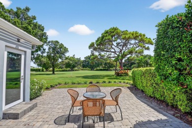 THIS COMPLETELY REMODELED VILLA HAS WIDE OPEN VIEWS OF THE 15TH on Delray Dunes Golf and Country Club in Florida - for sale on GolfHomes.com, golf home, golf lot