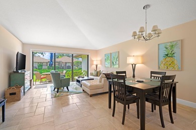 Spectacular turnkey 2BR/2BA Club Cottage with serene canal views on PGA National Golf Club in Florida - for sale on GolfHomes.com, golf home, golf lot