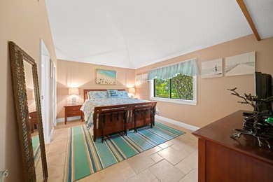 Spectacular turnkey 2BR/2BA Club Cottage with serene canal views on PGA National Golf Club in Florida - for sale on GolfHomes.com, golf home, golf lot