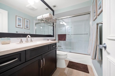 Spectacular turnkey 2BR/2BA Club Cottage with serene canal views on PGA National Golf Club in Florida - for sale on GolfHomes.com, golf home, golf lot