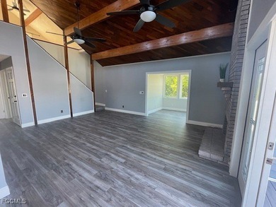 TROPICAL ISLAND RETREAT - 4 BEDROOMS - 3 BATHROOMS POOL HOME on Alden Pines Golf Club in Florida - for sale on GolfHomes.com, golf home, golf lot