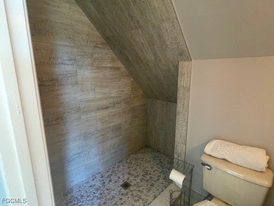 TROPICAL ISLAND RETREAT - 4 BEDROOMS - 3 BATHROOMS POOL HOME on Alden Pines Golf Club in Florida - for sale on GolfHomes.com, golf home, golf lot