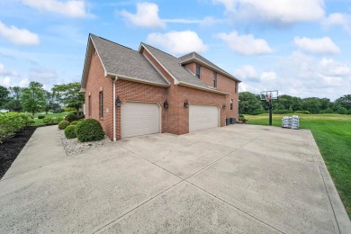 Make this all-brick executive Foxfire estate your home and you on Foxfire Golf Club in Ohio - for sale on GolfHomes.com, golf home, golf lot
