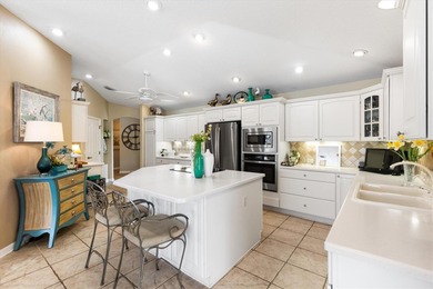 Perched high above the #1 Tee box of the Erinn Glenn nine hole on Nancy Lopez Legacy Golf and Country Club in Florida - for sale on GolfHomes.com, golf home, golf lot