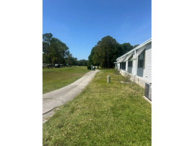 Discover the perfect blend of privacy and picturesque views in on Schalamar Creek Golf and Country Club in Florida - for sale on GolfHomes.com, golf home, golf lot