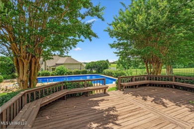 Step inside this beautifully built home with a grand on Cherokee Valley Golf Course in Mississippi - for sale on GolfHomes.com, golf home, golf lot