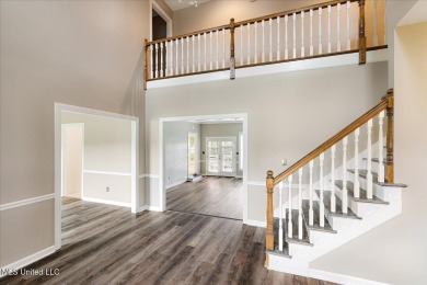Step inside this beautifully built home with a grand on Cherokee Valley Golf Course in Mississippi - for sale on GolfHomes.com, golf home, golf lot