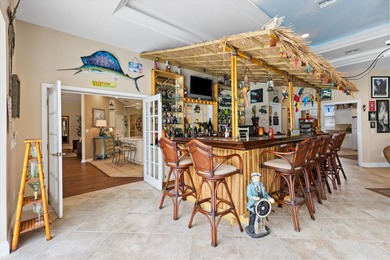 Perched high above the #1 Tee box of the Erinn Glenn nine hole on Nancy Lopez Legacy Golf and Country Club in Florida - for sale on GolfHomes.com, golf home, golf lot