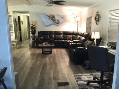 Meticulously maintained home in the much sought after Spanish on Spanish Lakes I in Florida - for sale on GolfHomes.com, golf home, golf lot
