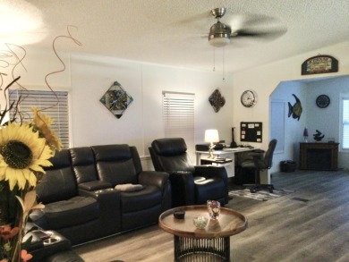 Meticulously maintained home in the much sought after Spanish on Spanish Lakes I in Florida - for sale on GolfHomes.com, golf home, golf lot