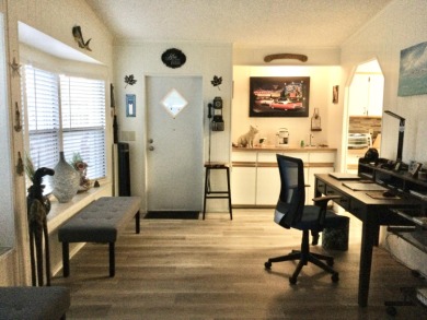Meticulously maintained home in the much sought after Spanish on Spanish Lakes I in Florida - for sale on GolfHomes.com, golf home, golf lot