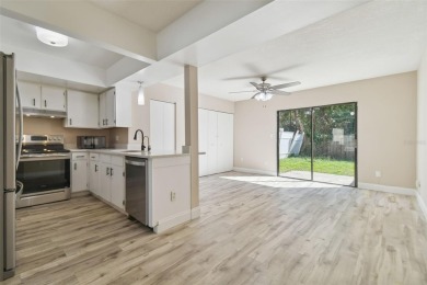 3BR/2.5BA TOWNHOME in the heart of Northdale, zoned to A-RATED on Northdale Golf and Tennis Club in Florida - for sale on GolfHomes.com, golf home, golf lot