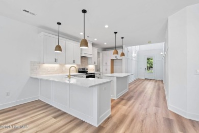 Nestled in the heart of the Shallotte Point area, this home on Rivers Edge Golf Club in North Carolina - for sale on GolfHomes.com, golf home, golf lot