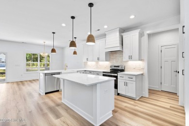 Nestled in the heart of the Shallotte Point area, this home on Rivers Edge Golf Club in North Carolina - for sale on GolfHomes.com, golf home, golf lot