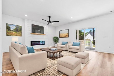 Nestled in the heart of the Shallotte Point area, this home on Rivers Edge Golf Club in North Carolina - for sale on GolfHomes.com, golf home, golf lot