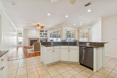 Under contract-accepting backup offers. This stunning on Hunters Green Country Club in Florida - for sale on GolfHomes.com, golf home, golf lot