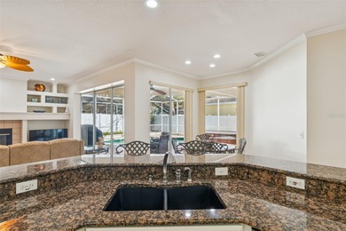 Under contract-accepting backup offers. This stunning on Hunters Green Country Club in Florida - for sale on GolfHomes.com, golf home, golf lot