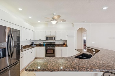 Under contract-accepting backup offers. This stunning on Hunters Green Country Club in Florida - for sale on GolfHomes.com, golf home, golf lot