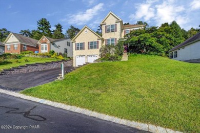 Discover this Stunning Home Built by Toll Brothers with over 3 on Country Club of the Poconos Golf Course in Pennsylvania - for sale on GolfHomes.com, golf home, golf lot