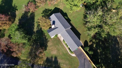 Dreaming of the perfect blend of modern living and country on La Follette Country Club in Tennessee - for sale on GolfHomes.com, golf home, golf lot