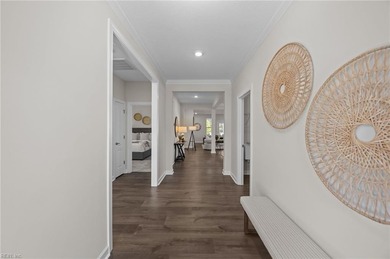 Stylish one-level home in a resort-style community featuring an on Sound Golf Links at Albemarle Plantation in North Carolina - for sale on GolfHomes.com, golf home, golf lot