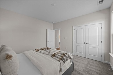 Stylish one-level home in a resort-style community featuring an on Sound Golf Links at Albemarle Plantation in North Carolina - for sale on GolfHomes.com, golf home, golf lot