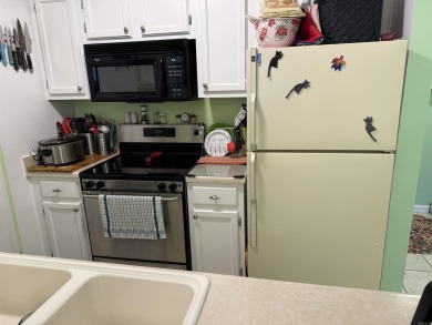 LOOKING FOR A NICE CONDO WITH EXTRA SPACE?  Check out this on Indian Hills Country Club in Arkansas - for sale on GolfHomes.com, golf home, golf lot