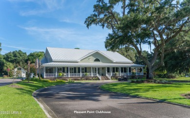 Large wooded lot located in Pleasant Point Plantation situated on The Golf Club at Pleasant Point Plantation in South Carolina - for sale on GolfHomes.com, golf home, golf lot