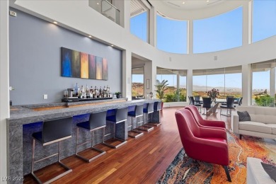 Perched on an elevated golf course lot w/ unrivaled strip views on  in Nevada - for sale on GolfHomes.com, golf home, golf lot