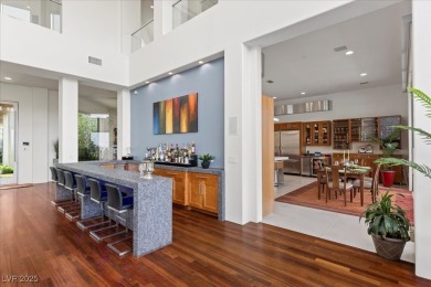 Perched on an elevated golf course lot w/ unrivaled strip views on  in Nevada - for sale on GolfHomes.com, golf home, golf lot