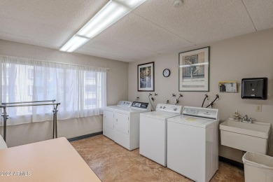 Beautifully maintained end unit condo located in a guard-gated on Scottsdale Shadows in Arizona - for sale on GolfHomes.com, golf home, golf lot