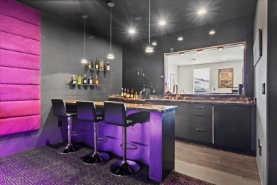 Perched on an elevated golf course lot w/ unrivaled strip views on  in Nevada - for sale on GolfHomes.com, golf home, golf lot