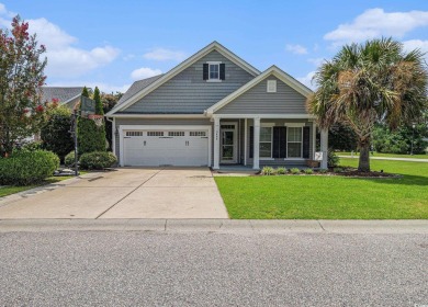 Set on a desirable corner lot, this spacious 4-bedroom, 3-bath on Myrtle Beach National Golf Course in South Carolina - for sale on GolfHomes.com, golf home, golf lot