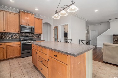 Set on a desirable corner lot, this spacious 4-bedroom, 3-bath on Myrtle Beach National Golf Course in South Carolina - for sale on GolfHomes.com, golf home, golf lot