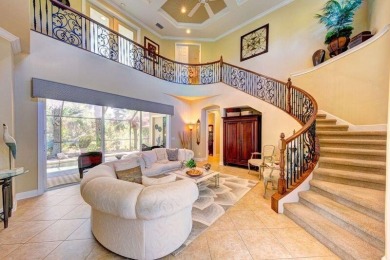 Exquisite townhouse with uniquely designed lagoon pool located on Spessard Holland Golf Course in Florida - for sale on GolfHomes.com, golf home, golf lot