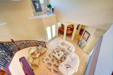 Exquisite townhouse with uniquely designed lagoon pool located on Spessard Holland Golf Course in Florida - for sale on GolfHomes.com, golf home, golf lot