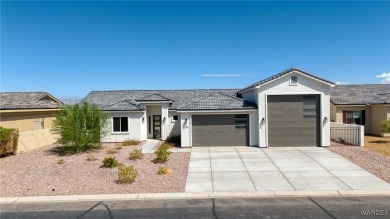 Welcome to your brand-new, never before lived in dream home on on Los Lagos Golf Club in Arizona - for sale on GolfHomes.com, golf home, golf lot