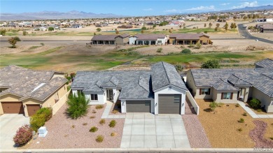 Welcome to your brand-new, never before lived in dream home on on Los Lagos Golf Club in Arizona - for sale on GolfHomes.com, golf home, golf lot