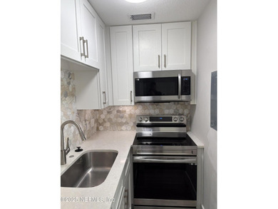 Freshly renovated with new tankless water heater, windows on Windsor Parke Golf Club in Florida - for sale on GolfHomes.com, golf home, golf lot