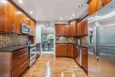 Pristine Home in The Hamlet located in the rear of the community on Meadow Brook Club in New York - for sale on GolfHomes.com, golf home, golf lot