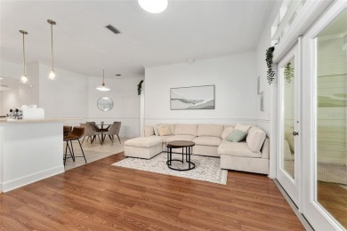 Welcome to this beautifully updated, low-maintenance home on Turkey Creek Golf and Country Club in Florida - for sale on GolfHomes.com, golf home, golf lot