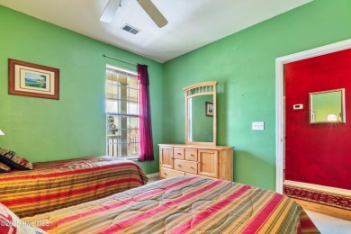 **TURN-KEY COASTAL CONDO IN SUNSET VILLAGE-FULLY FURNISHED-POND on Sandpiper Bay Golf and Country Club in North Carolina - for sale on GolfHomes.com, golf home, golf lot