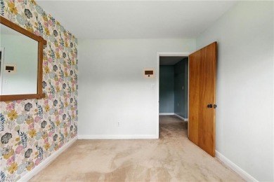 This stunning 4-bedroom, 3-bath home blends mid-century charm on James River Country Club in Virginia - for sale on GolfHomes.com, golf home, golf lot
