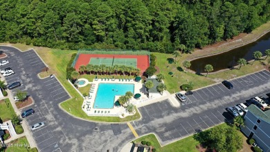 **TURN-KEY COASTAL CONDO IN SUNSET VILLAGE-FULLY FURNISHED-POND on Sandpiper Bay Golf and Country Club in North Carolina - for sale on GolfHomes.com, golf home, golf lot