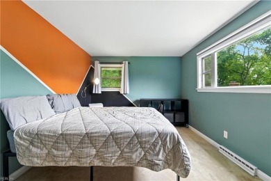 This stunning 4-bedroom, 3-bath home blends mid-century charm on James River Country Club in Virginia - for sale on GolfHomes.com, golf home, golf lot